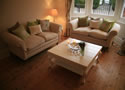 Lounge interior design incl Sofas, Coffee Table, Cushions & Lighting